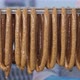 Fresh Sausages Are Placed On Racks In A Meat Processing Factory - VideoHive Item for Sale