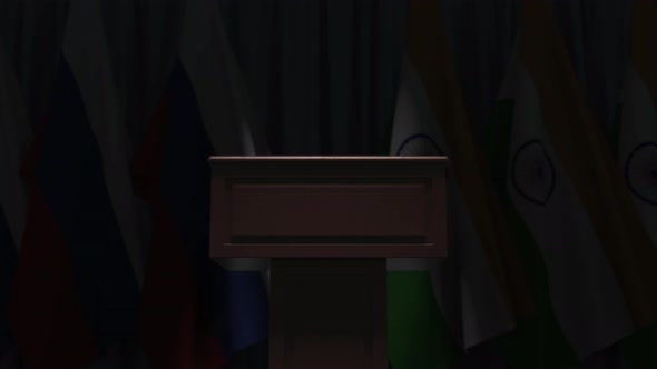 Row of Flags of India and Russia and Speaker Tribune alt