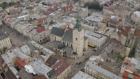 Aerial Drone Video Panorama of Latin Cathedral in City Lviv Ukraine Flight Above Roofs Streets