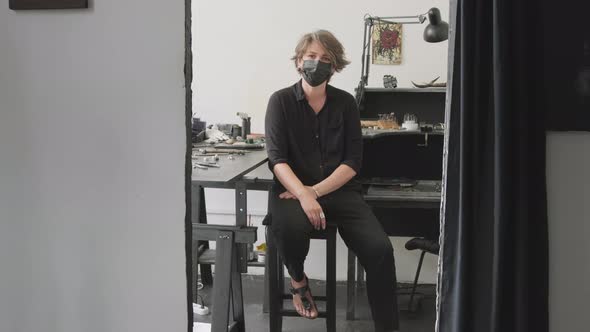 Portrait of Female Jeweler in Face Mask