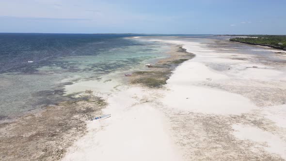 Aerial View of Low Tide in the Ocean Near the Coast of Zanzibar Tanzania Slow Motion