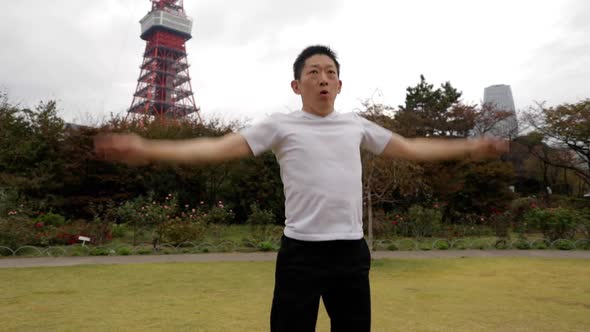 Middle-aged Japanese man exercises in Tokyo Japan