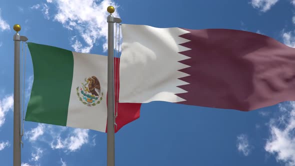 Mexico Flag Vs Qatar Flag On Flagpole