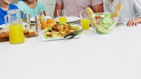 Family having healthy meal together at home