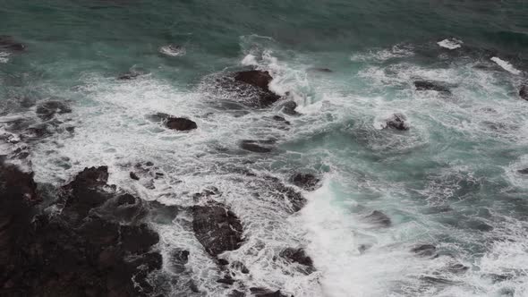 Peaceful calming Footage of beautiful blue ocean waves crashing the rocky shore at Loch Ard Gorge 12