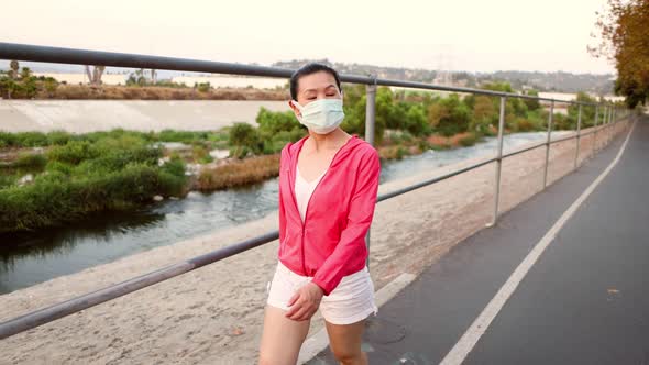 Asian woman going for a hike