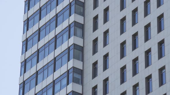 Exterior Establishing Shot of a Apartment Building. Residential Building Exterior with Blue Sky