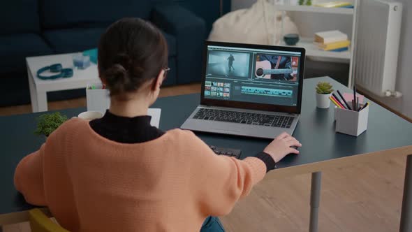 Female Colorist Working on Video Footage Design with Multimedia Software alt