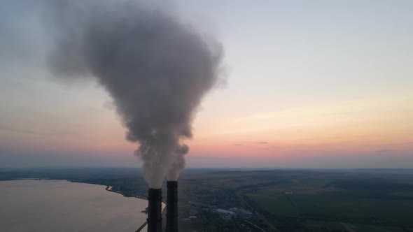 Aerial View of Coal Power Plant High Pipes with Black Smoke Moving Upwards Polluting Atmosphere at