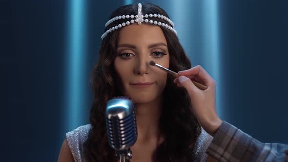 The Singer Gets Makeup