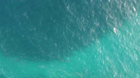 Aerial Over The Blue Deep Sea 4K
