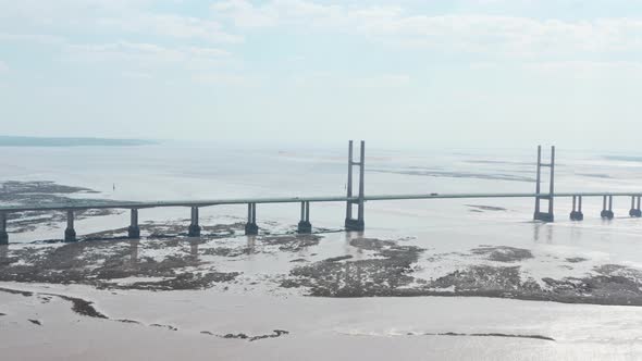Slider drone shot of Prince of wales Bridge over Severn Estuary