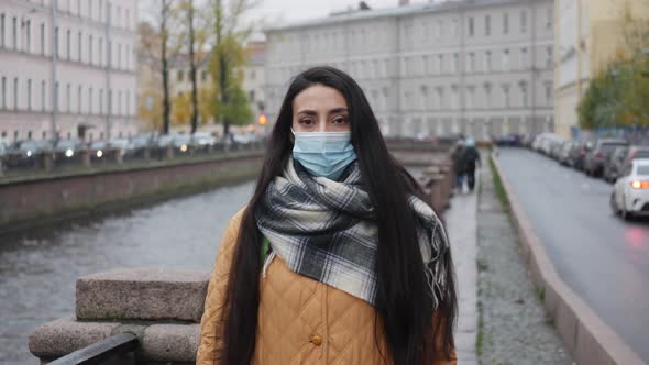 Middle Eastern Woman Take Off Her Mask and Breathe Normally. Covid Concept Health and Safety, N1H1