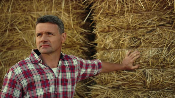 Portrait Farmer Inspect Field in Autumn