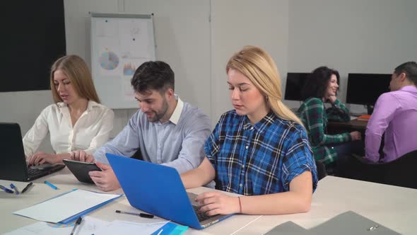 Young Professional Staff Working in the Office