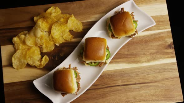 Rotating Shot of Delicious Pulled Pork Sliders