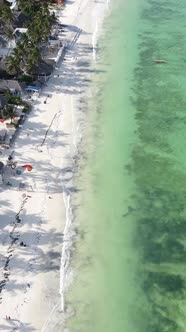 Vertical Video Boats in the Ocean Near the Coast of Zanzibar Tanzania