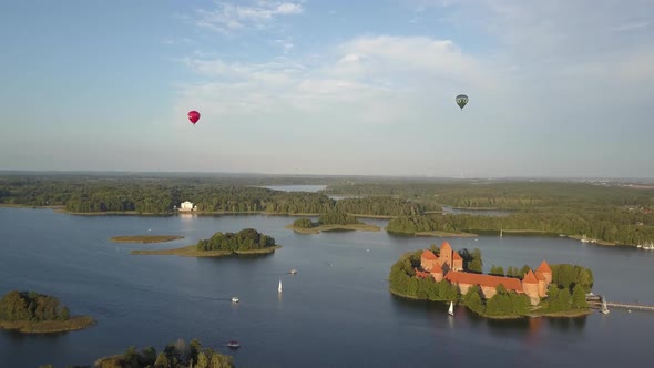 The Famous Trakai Castle on an Island in the Middle of Lake Galve, Surrounded By Trees. Shooting the