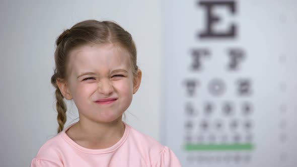 Female Child With Poor Eyesight Happy to Wear Comfortable Eyeglasses, Smile