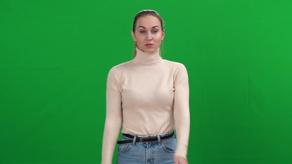 Serious Attractive Caucasian Woman Shaking Head No and Crossing Hands Looking at Camera