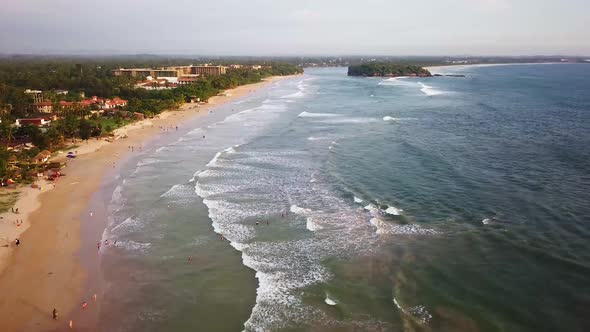 Aerial Top View Ocean Waves. Sea Waves on the Dangerous Stones Aerial View Drone Shot. Bird's Eye