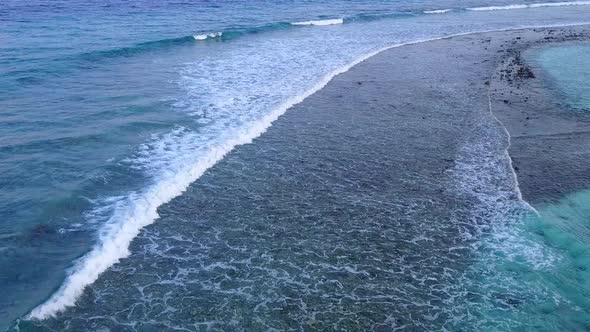Warm texture of marine island beach trip by ocean with sand background near waves