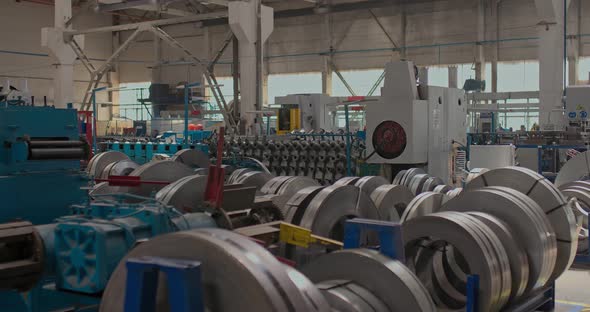 Coils of Metal are in the Factory Floor Closeup