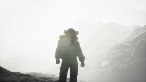 Astronaut on Another Planet with Dust and Fog alt