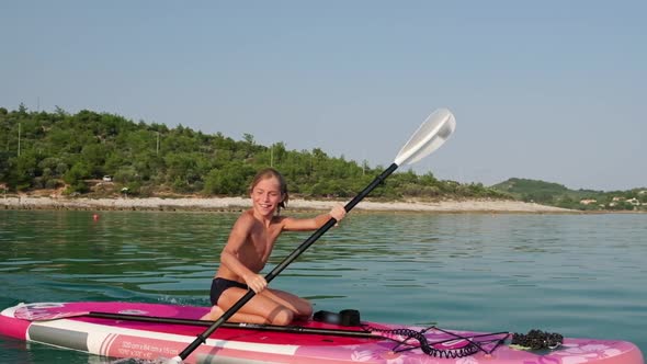 Kid on Paddle Board