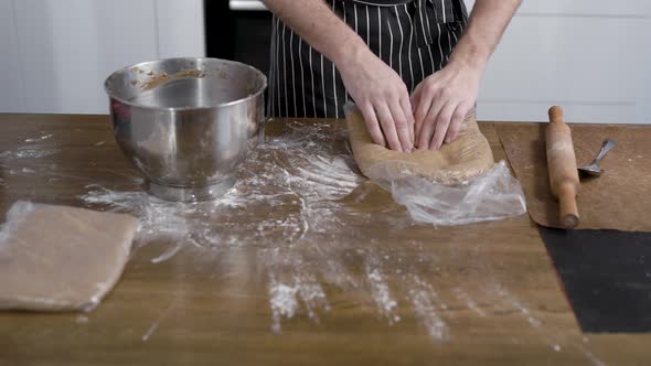 The Cook Has Prepared a Dough for Cupcakes or Gingerbread. The Cook Removes the Dough for Whatever