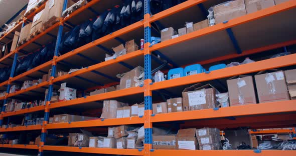 Footage of the Full Shelves of a Storehouse, Shelves with Goods, 