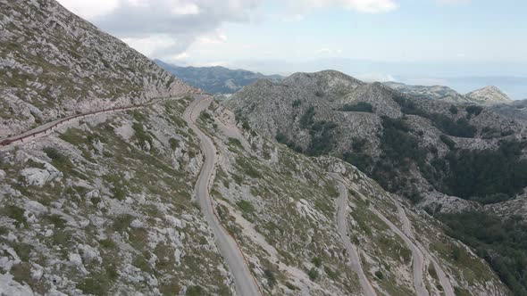 Dangerous Alpine Road Against the Backdrop of a Fantastically Beautiful Landscape in the Biokovo