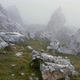 Drone flight over the foggy rocks of the Dolomites - VideoHive Item for Sale