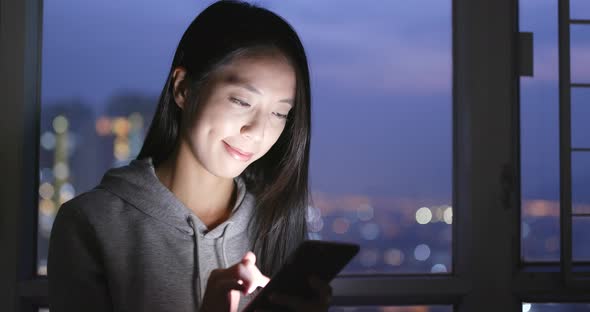 Young Woman Use of Smart Phone at Home