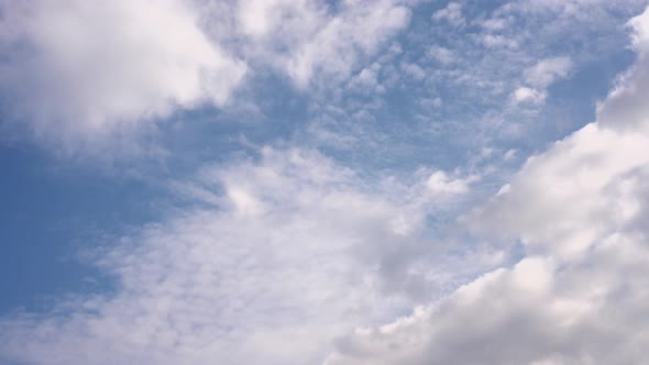 White clouds in the windy Blue sky. Cloudscape timelapse. Nature weather