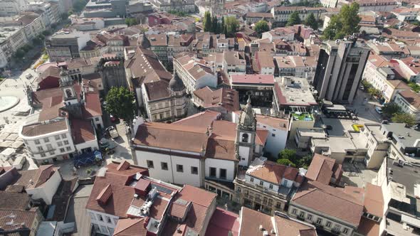 Drone top down over Braga city centre houses with church and Squares - Portugal