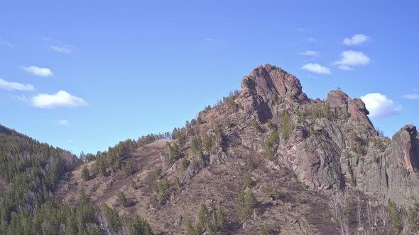 Aerial Hyperlapse of Takmak Rock in the Stolby Nature Park in Krasnoyarsk