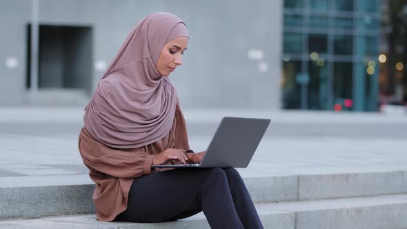 Serious Focused Muslim Young Business Woman Freelancer Islamic Girl Student in Hijab Female User