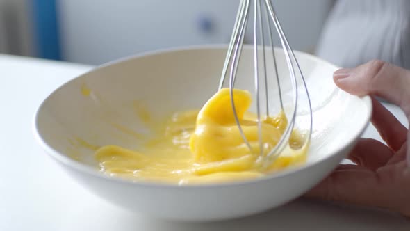 Woman Preparing Homemade Omelette