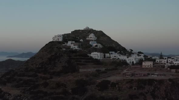 Greece Village Built on Island Mountain Site Aerial View