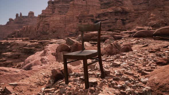 Old Wooden Chair on Rocks of Grand Canyon