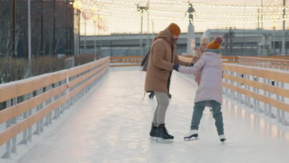 Dad Teacher Daughter Ice-Skating