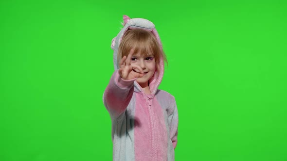 Little Child Girl Smiling Showing Thumbs Up Ok Gesture Agree Sign in Unicorn Pajama on Chroma Key