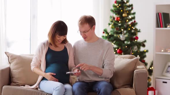 Happy Couple with Ultrasound Images on Christmas 21