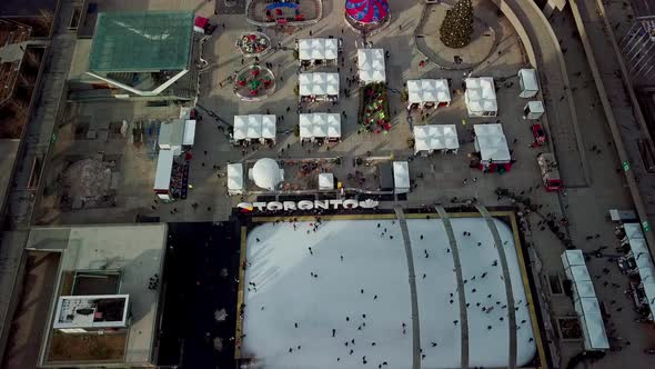 Ice Skaters Enjoying Nathan Phillips Square Holiday Fair - aerial shot