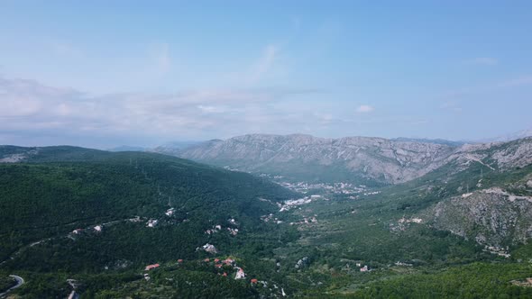 Drone flight over a mountainous countryside landscape, Dinaric Alps, Croatia