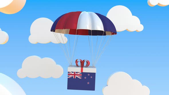 Box with National Flag of New Zealand Falls with a Parachute