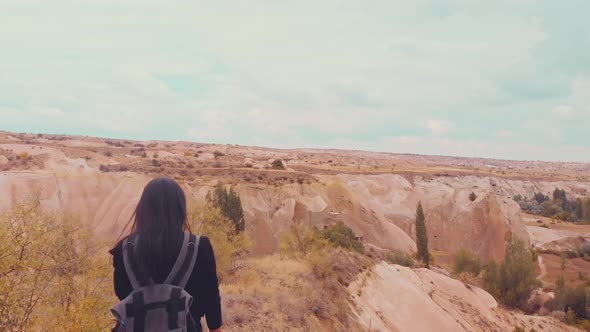 Back View Woman Hiking In Kapadokya (Cinematic)