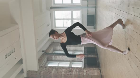 Adorable Young Ballerina Dancing Alone