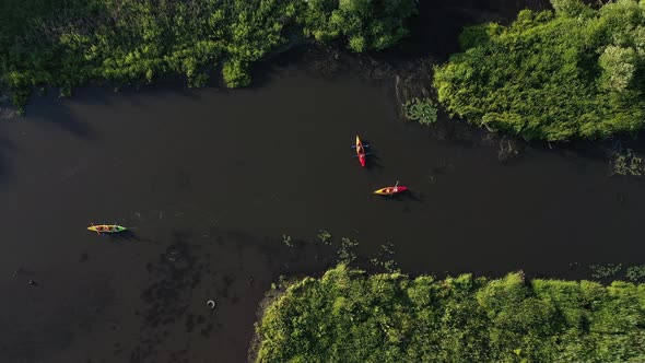 Top View of the Svisloch River Kayakers Floating on the River in the City's Loshitsky Park at Sunset